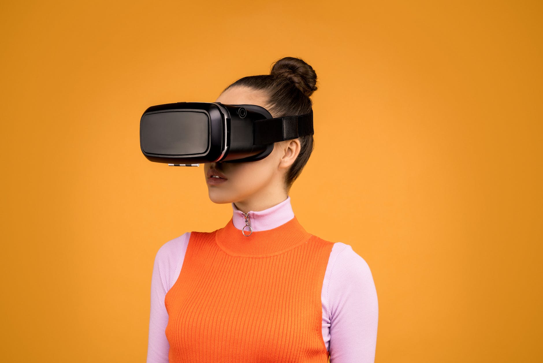 woman using virtual reality goggles